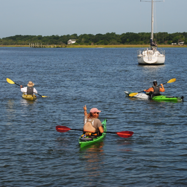 Kayak guide pointing eco tour