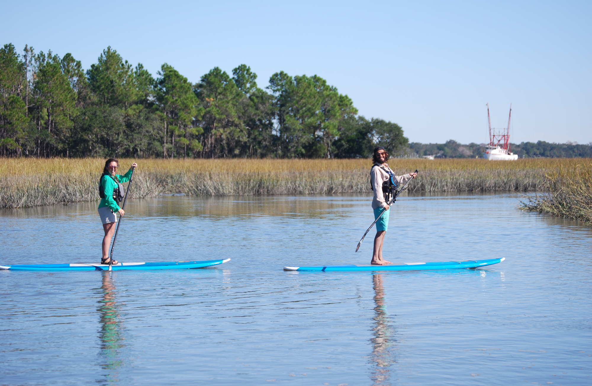 Paddleboarding in a small creek